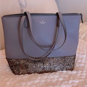 Light purple kate spade purse with glitter bottom outline!